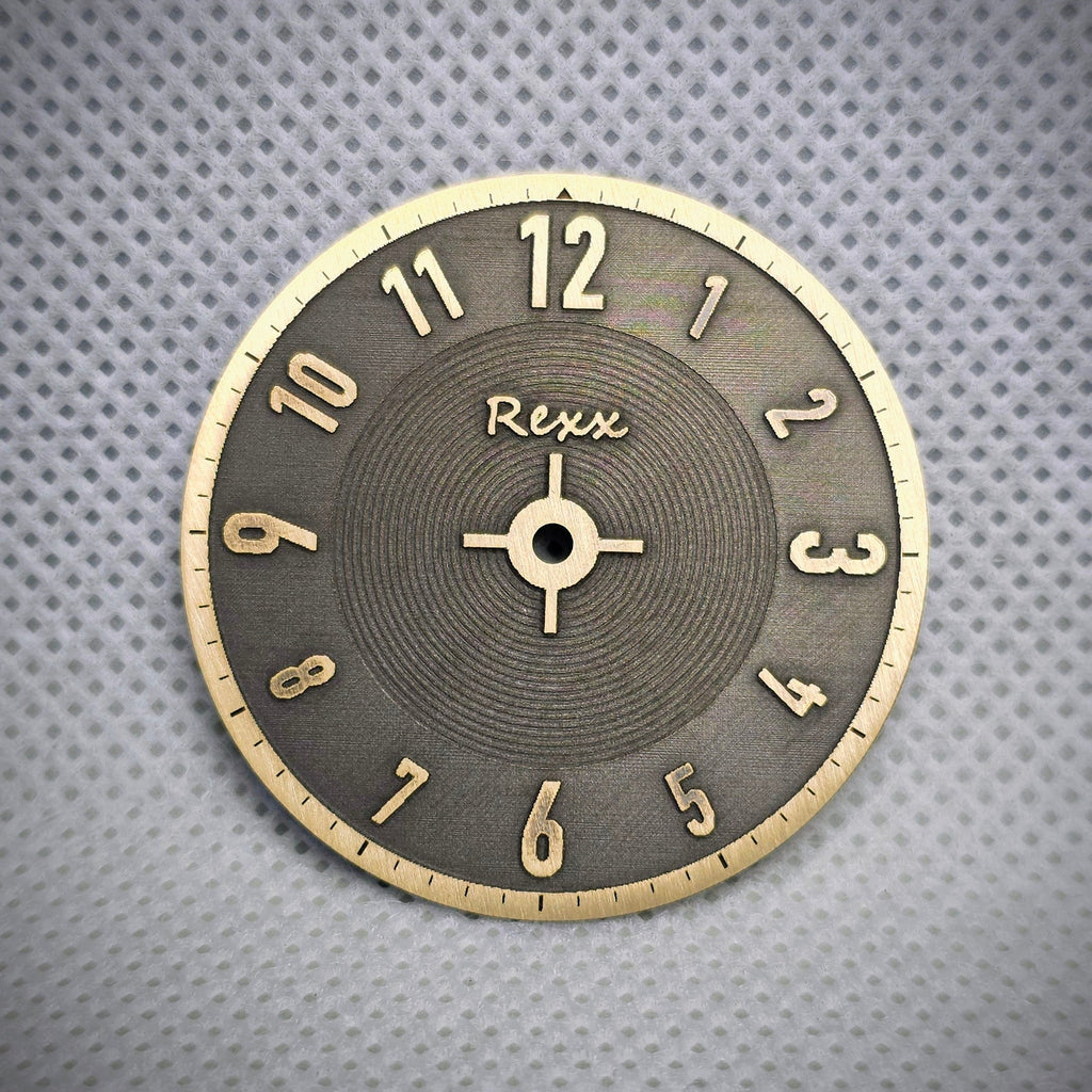 Finished two-tone brass watch dial with raised numerals and engraved texture by Rexx Timepieces