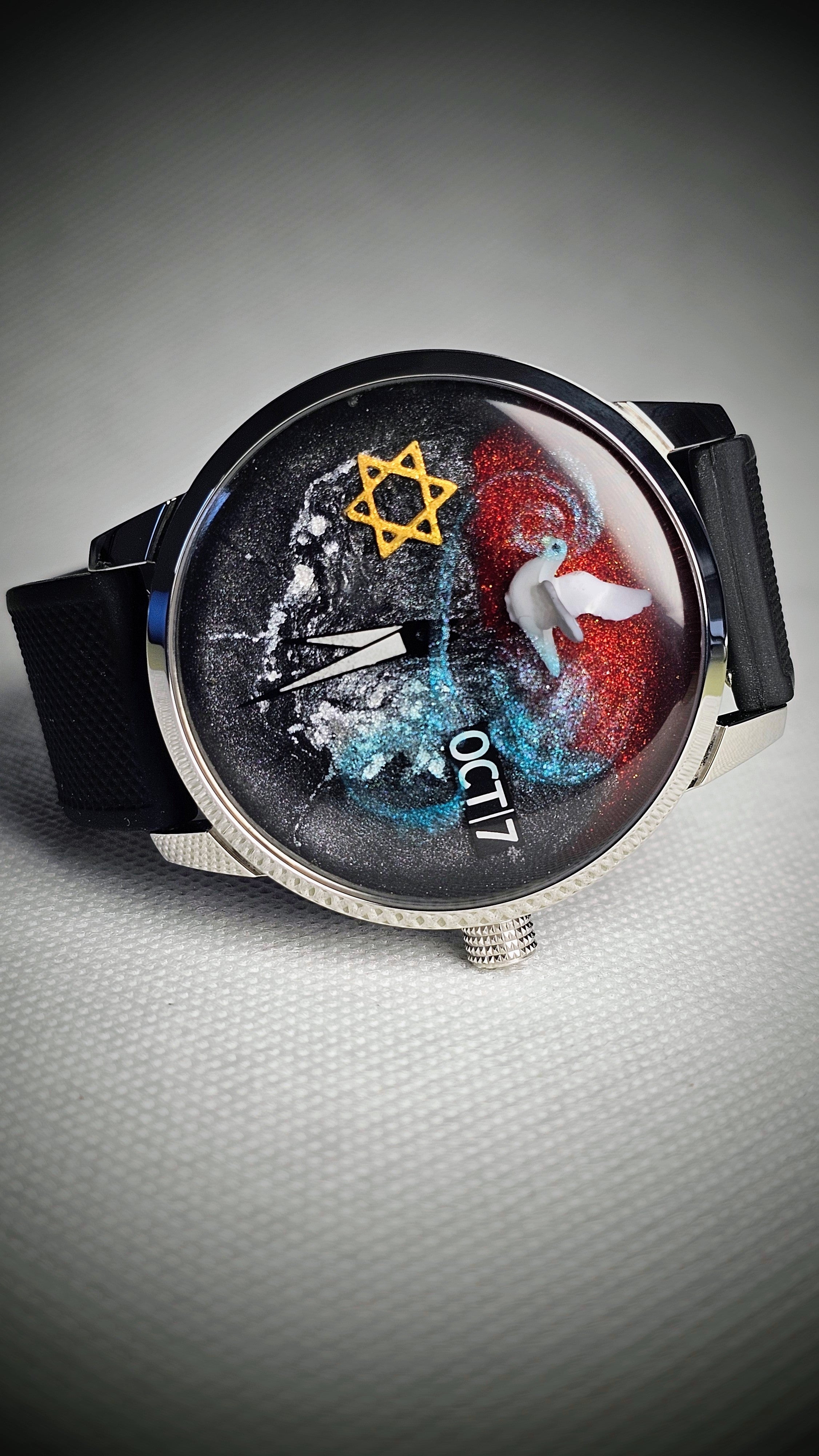 Story-led custom watch with a six-pointed star, white dove and October 7 inscription