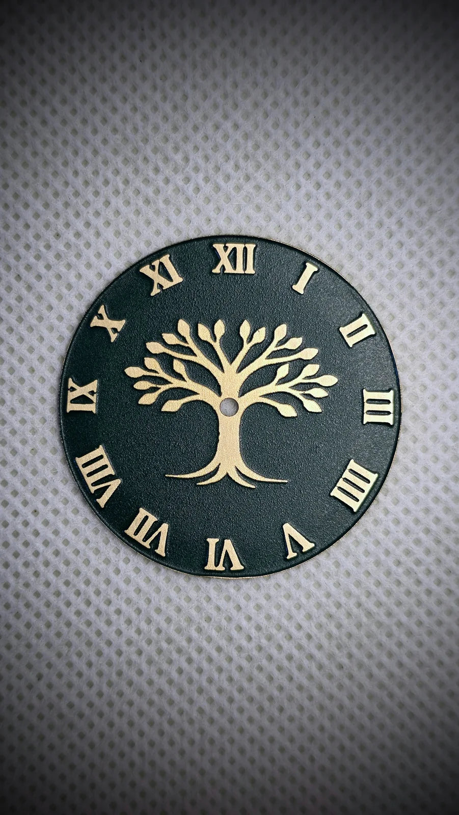Green custom dial with a brass Tree of Life