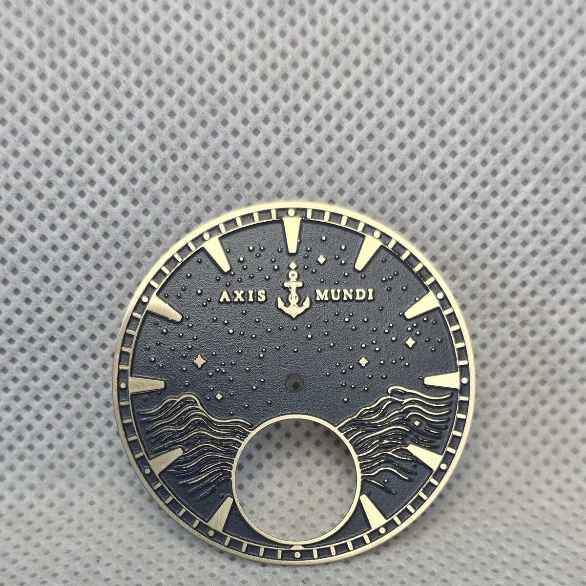 Dark blue and warm metal astronomical watch dial with a lower aperture